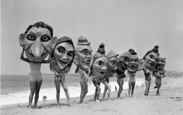 Women Posing With Giant and Creepy Masks From the Venice Beach Mardi Gras Festival in 1935