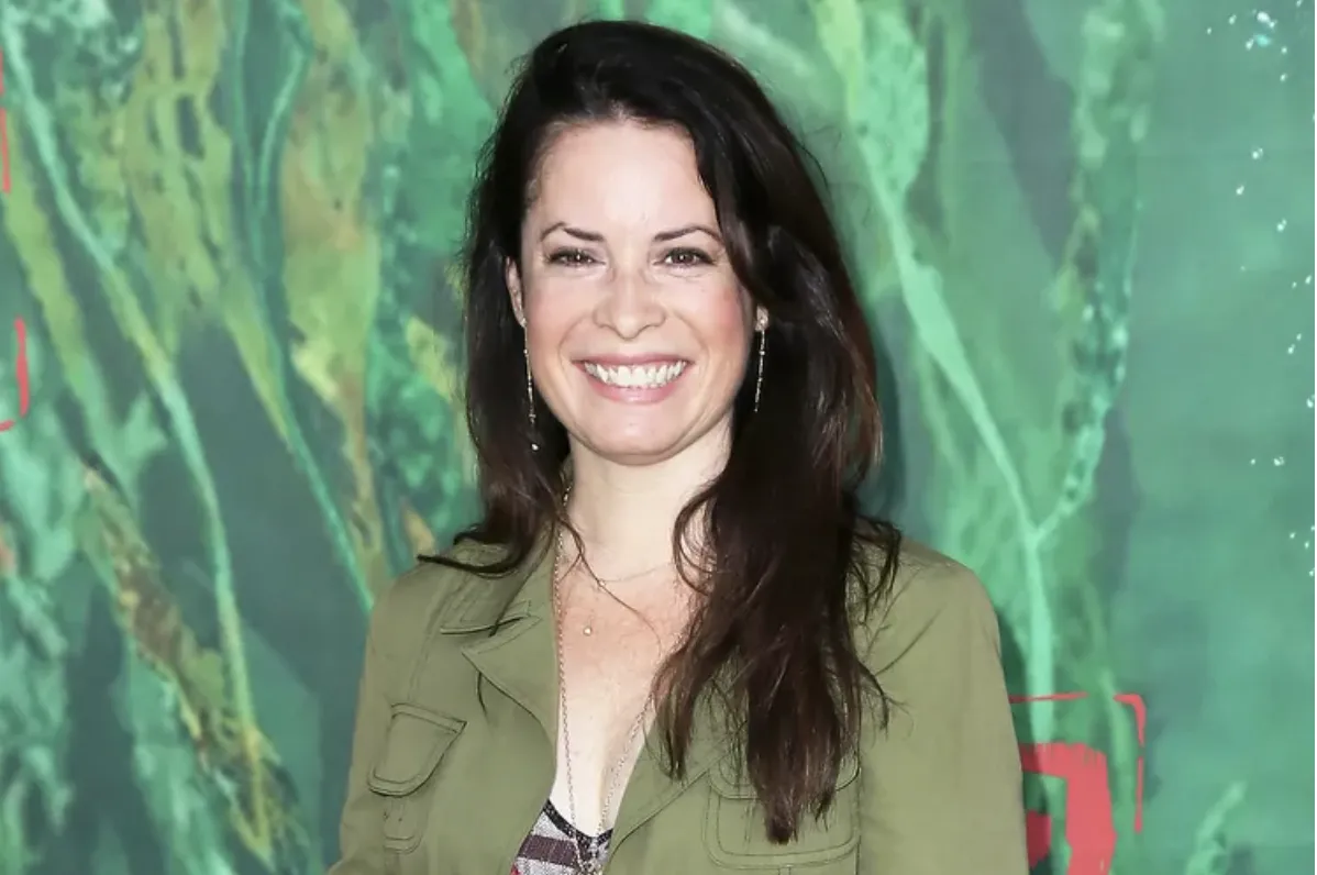 Holly Marie Combs Reveals How Close the 'Charmed' Cast Got After She Developed a 'Rather Large Tumor'