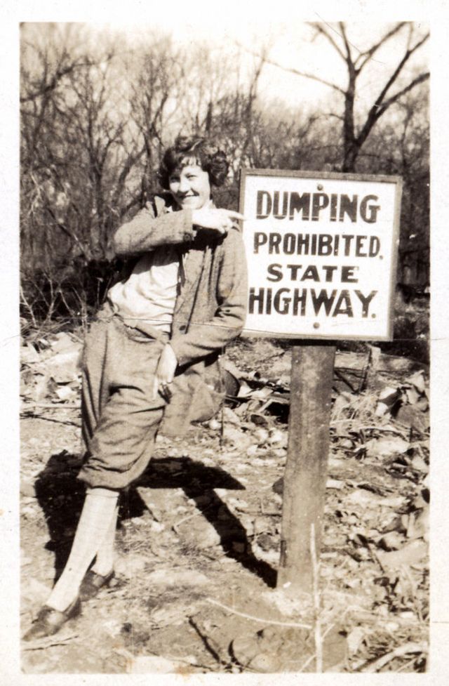 Cool Snaps Capture People Posing With Signs in the Past