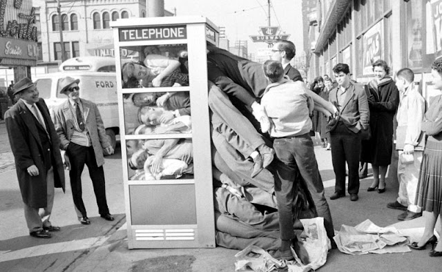 Telephone booth stuffing emerged as one of the eccentric trends of the 1950s.