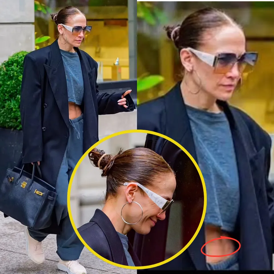 Something surprising: 54-year-old Jennifer Lopez stepped out without makeup and wet hair while showing off her abs in a crop top in New York... after the trailer for her movie Atlas debuted!
