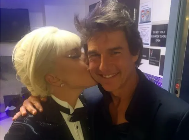 Tom Cruise shows off scruffy hair as he kisses Lady Gaga backstage at her Vegas show