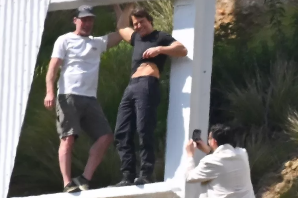 Tom Cruise Flashes His Abs While Scaling the Hollywood Sign in Los Angeles