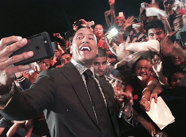 Dwayne Johnson receives VERY warm welcome from fans in Mexico City at San Andreas premiere