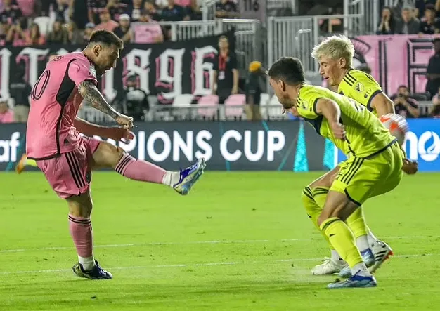 Lionel Messi is taunted by 'Ronaldo, Ronaldo' chants from Nashville fans in the CONCACAF Champions Cup... before Argentina star scores 14 seconds later to silence them in 3-1 win for David Beckham's Inter Miami