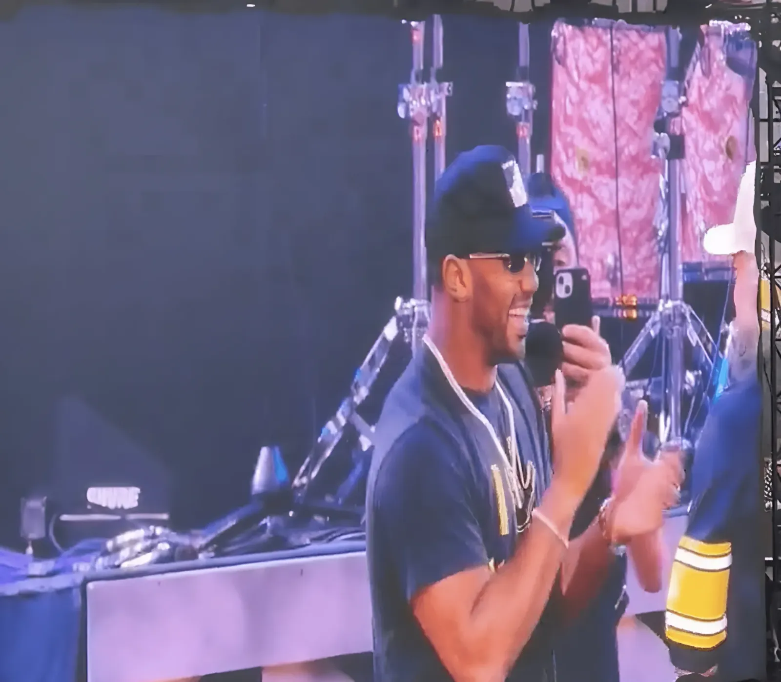 Russell Wilson Joins Zac Brown Brand on Stage at Kenny Chesney Concert