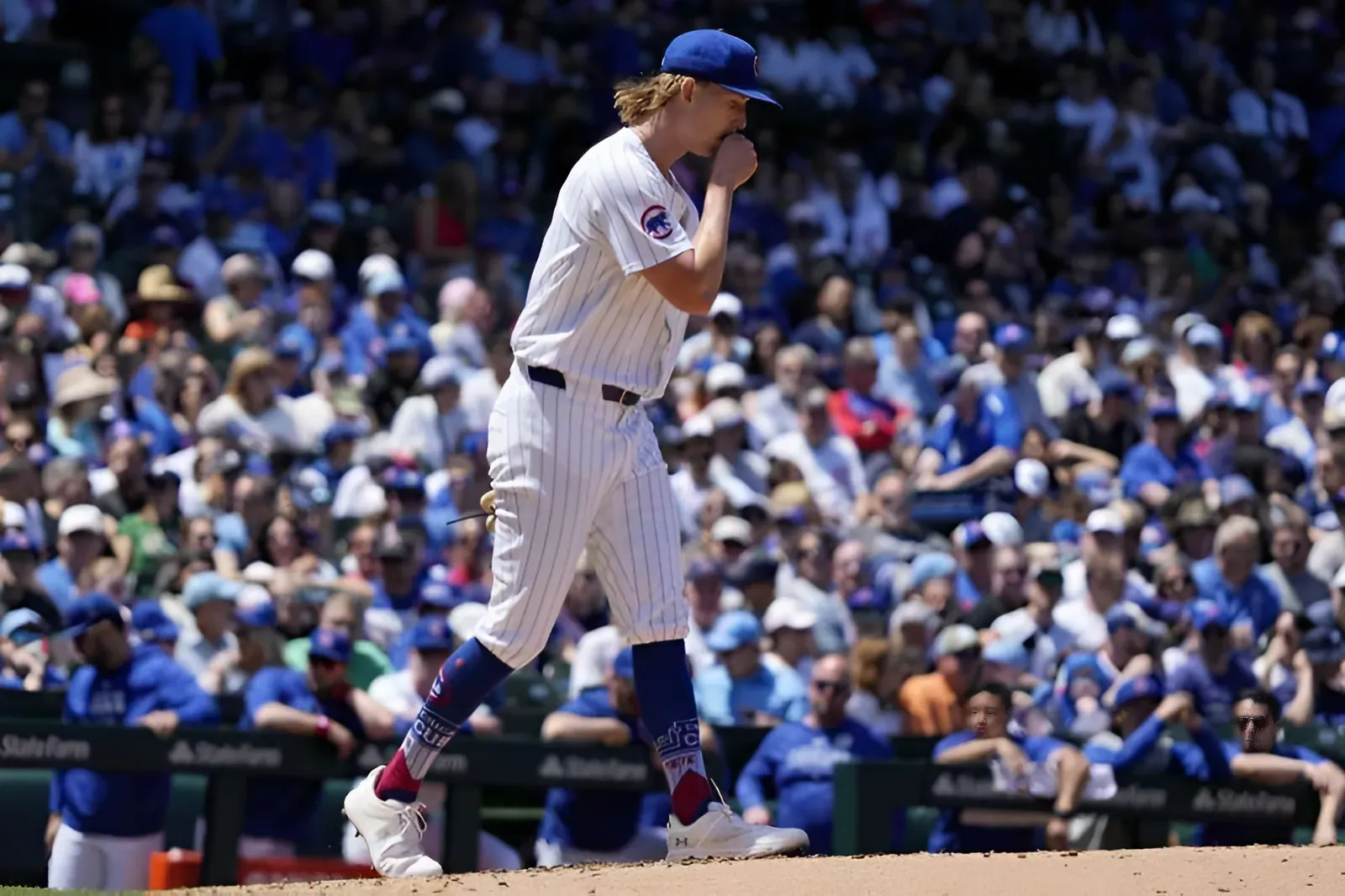 Friedl hits a 3-run homer as the Reds beat the slumping Cubs 5-2