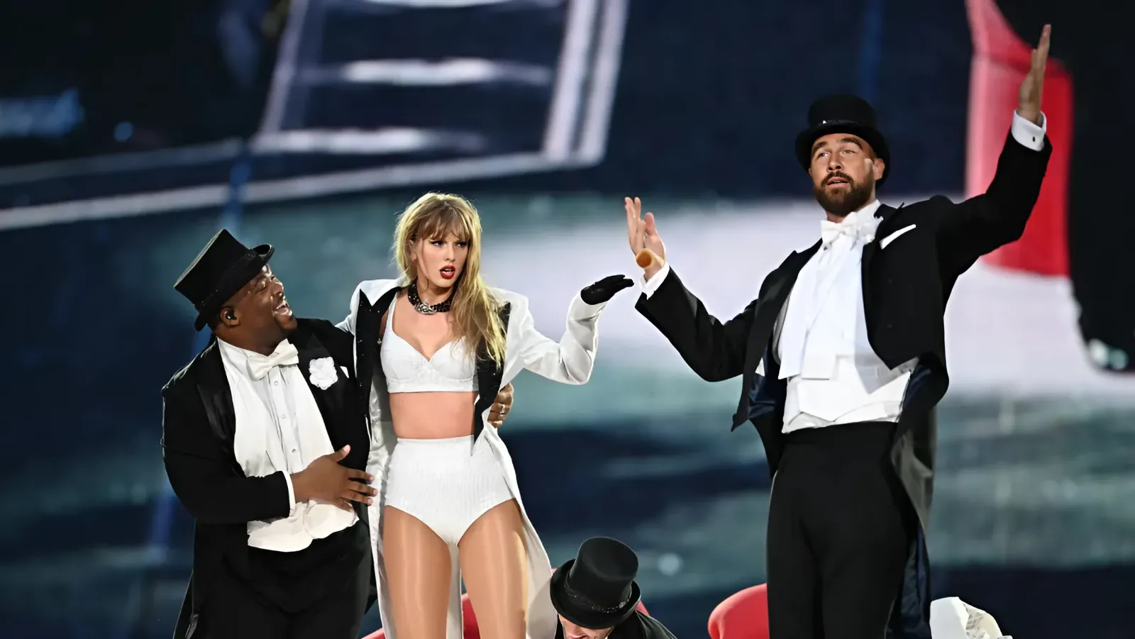 Travis Kelce gets his first carry in the music business on Taylor Swift's Eras Tour