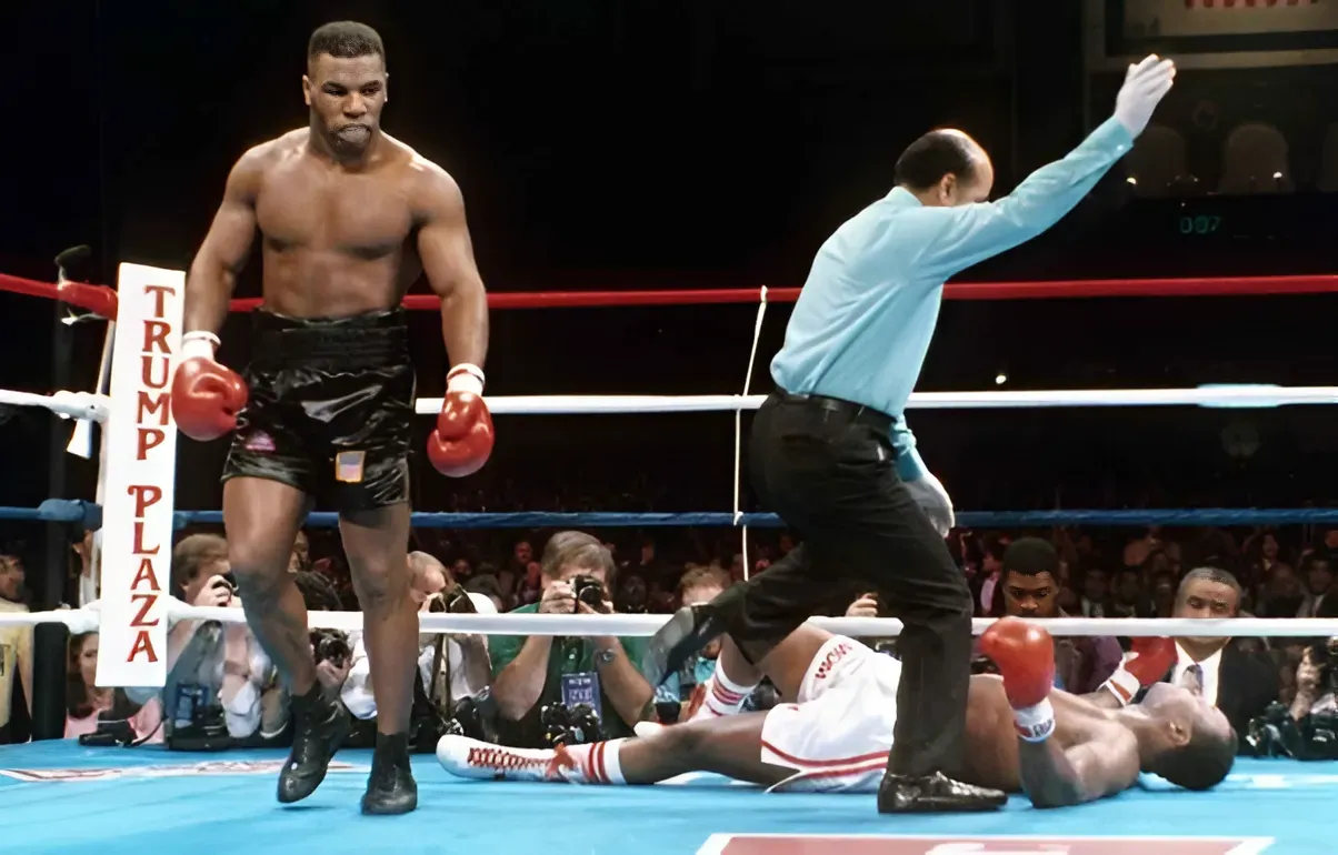 Would Larry Holmes had done better in a rematch with Mike Tyson with a few more matches under his belt?