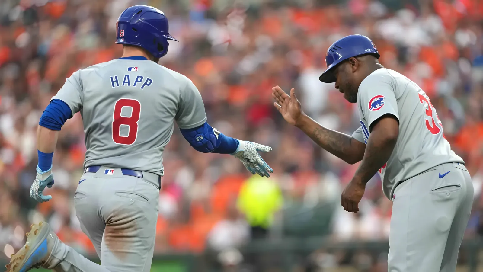 Cubs beat Orioles with Busch, Happ and Bigge leading the way