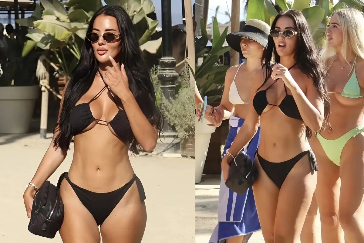 Yazmin Oukhellou sends temperatures soaring in a skimpy black thong bikini as she hits the beach during sunshine break in Marbella ngocc