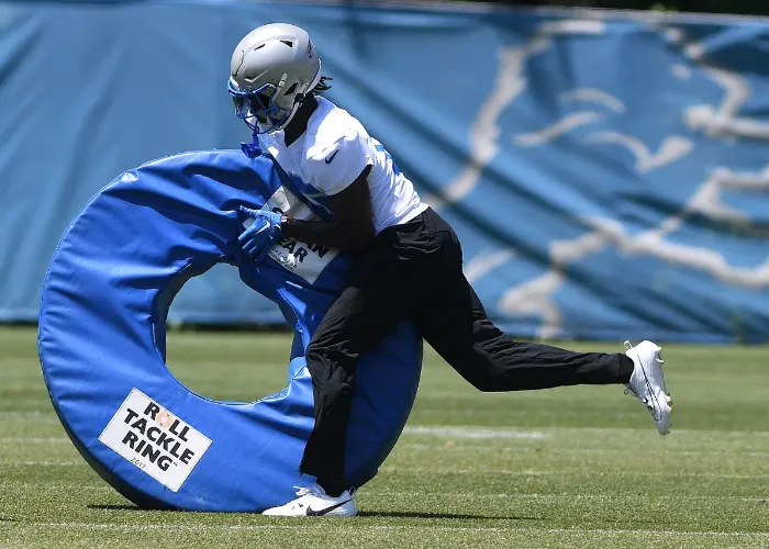 Lions teaching against hip-drop tackle as pads come on: 'Our guys will adjust'