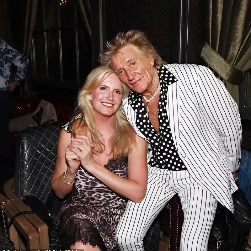 Rod Stewart, 79, and wife Penny Lancaster, 53, pose for a rare group snap with his children as they celebrate the anniversary of his whisky brand in Las Vegas ngocc