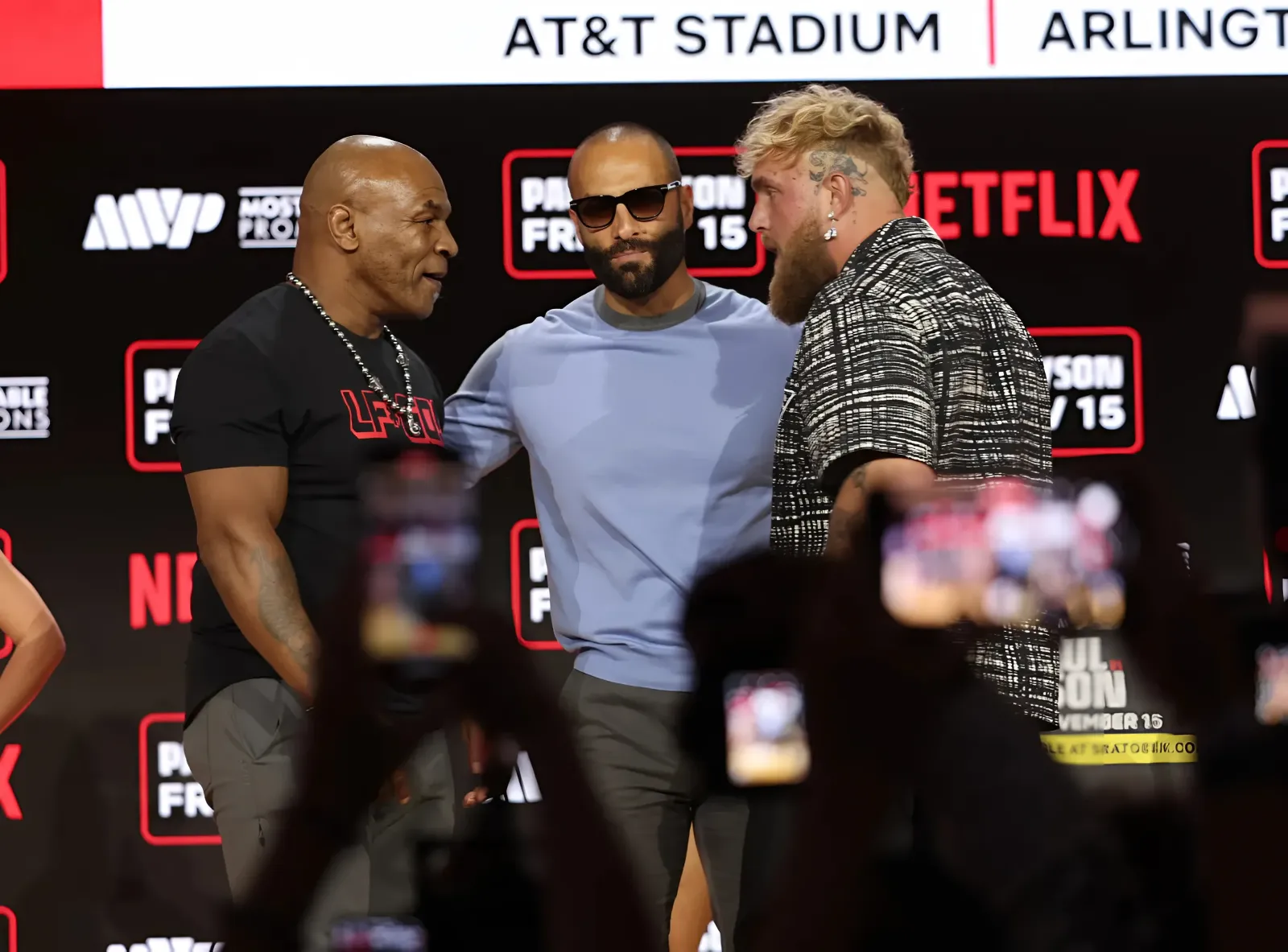 Mike Tyson, Jake Paul build boxing fight hype with scuffle, barbs: 'He is going to run'