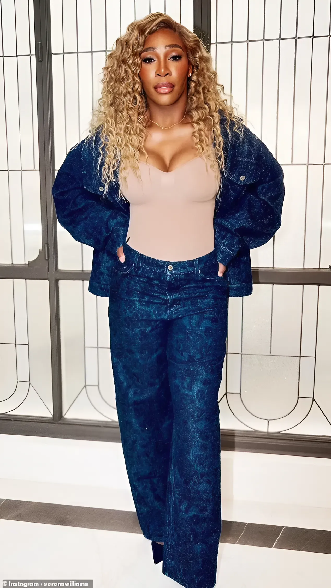 Serena Williams poses in denim-on-denim look as she declares she is '100 percent real' from 'forehead to toe'