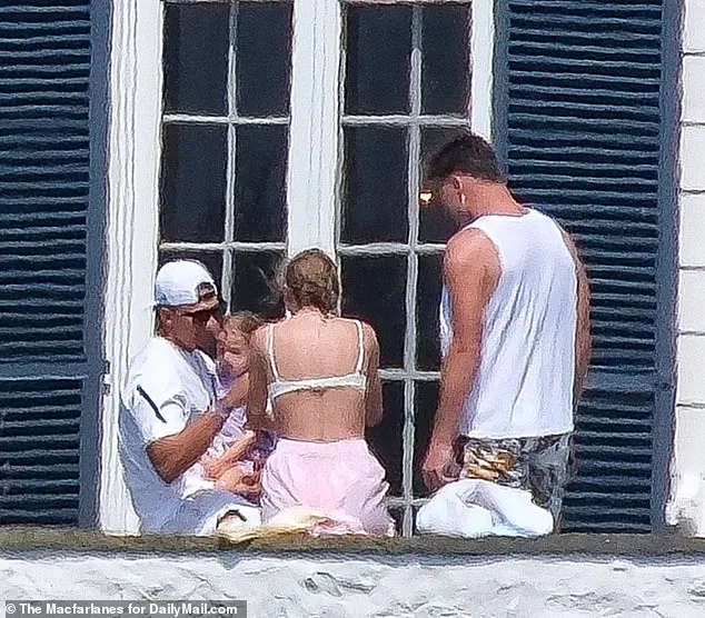 Taylor Swift and Travis Kelce have baby fever as they are seen cooing over Patrick Mahomes's daughter at her Rhode Island mansion, Looks like they are ready for one of their own...