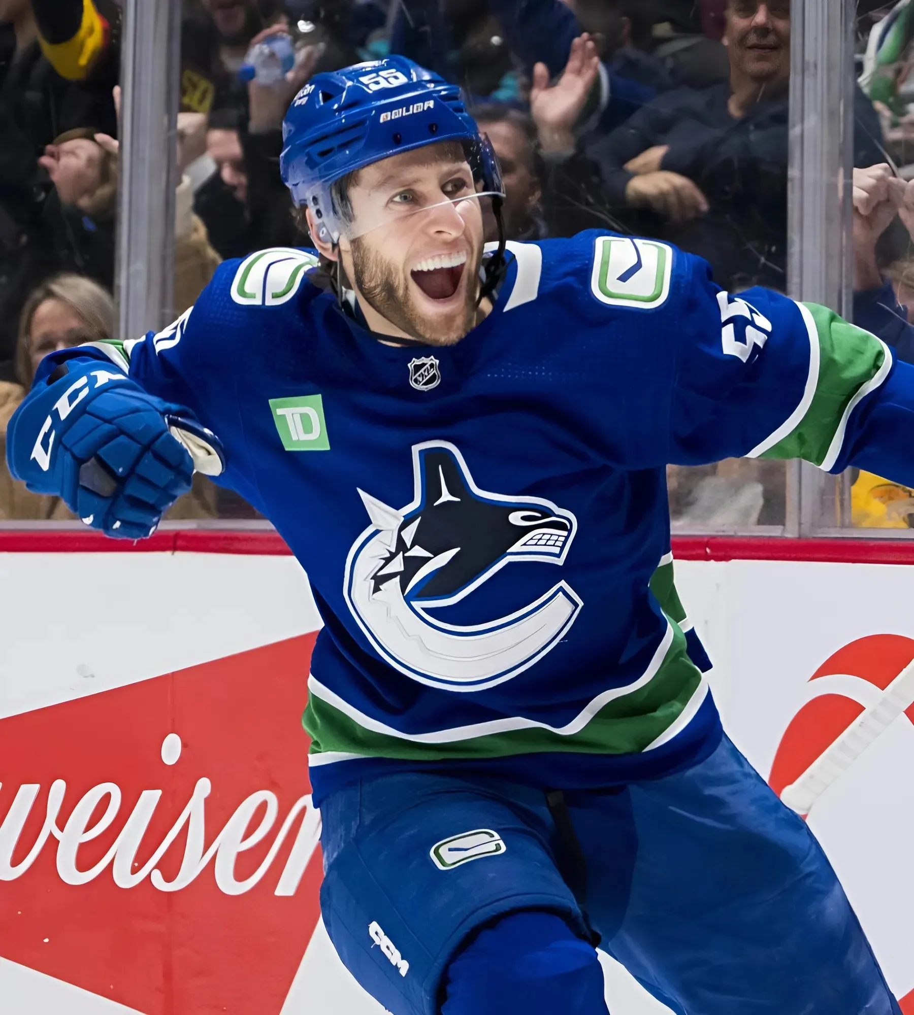 Canucks place Jett Woo and Guillaume Brisebois on waivers