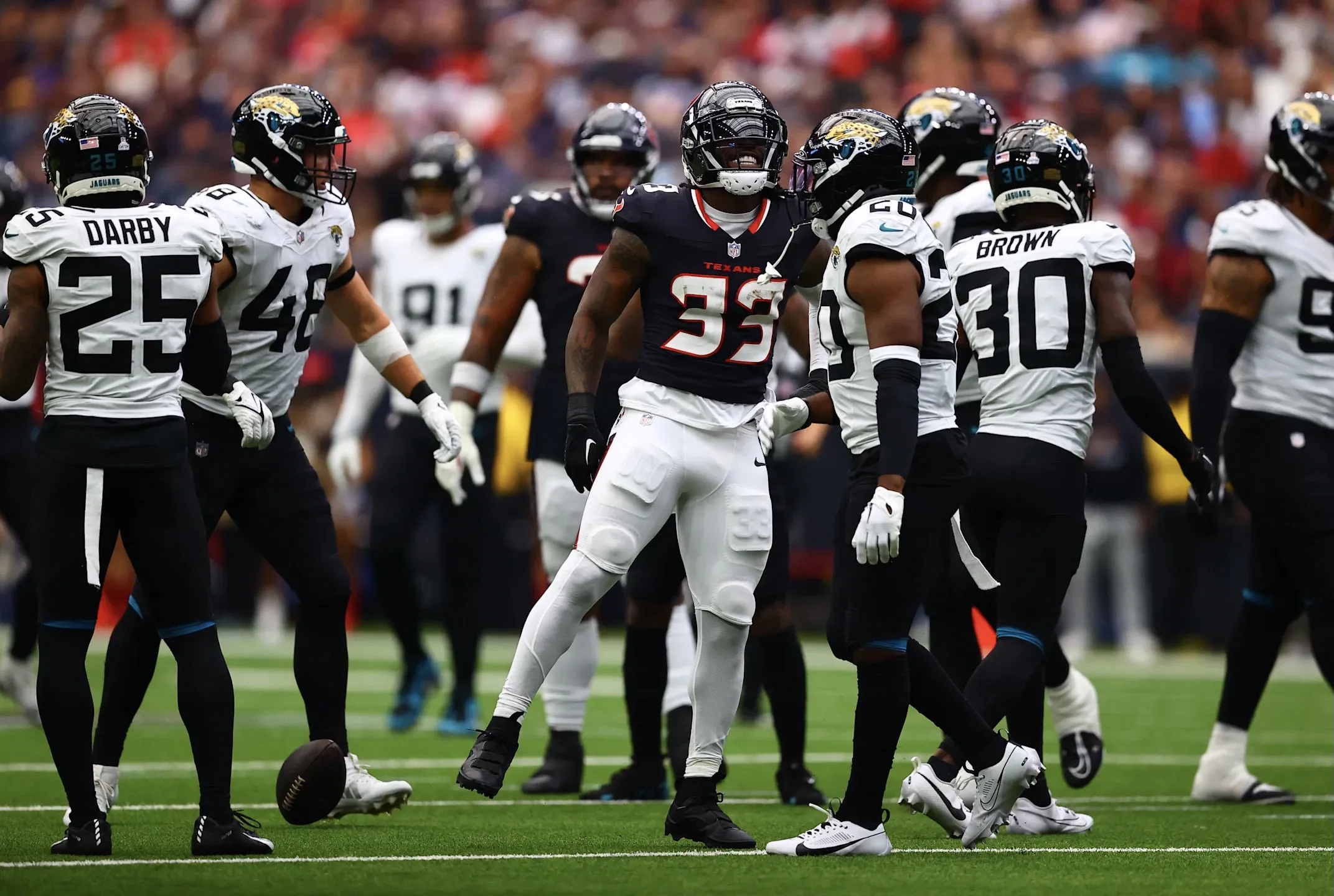 Arike Ogunbowale reacts to Texans running back Dare Ogunbowale's game-winning TD vs. Jaguars