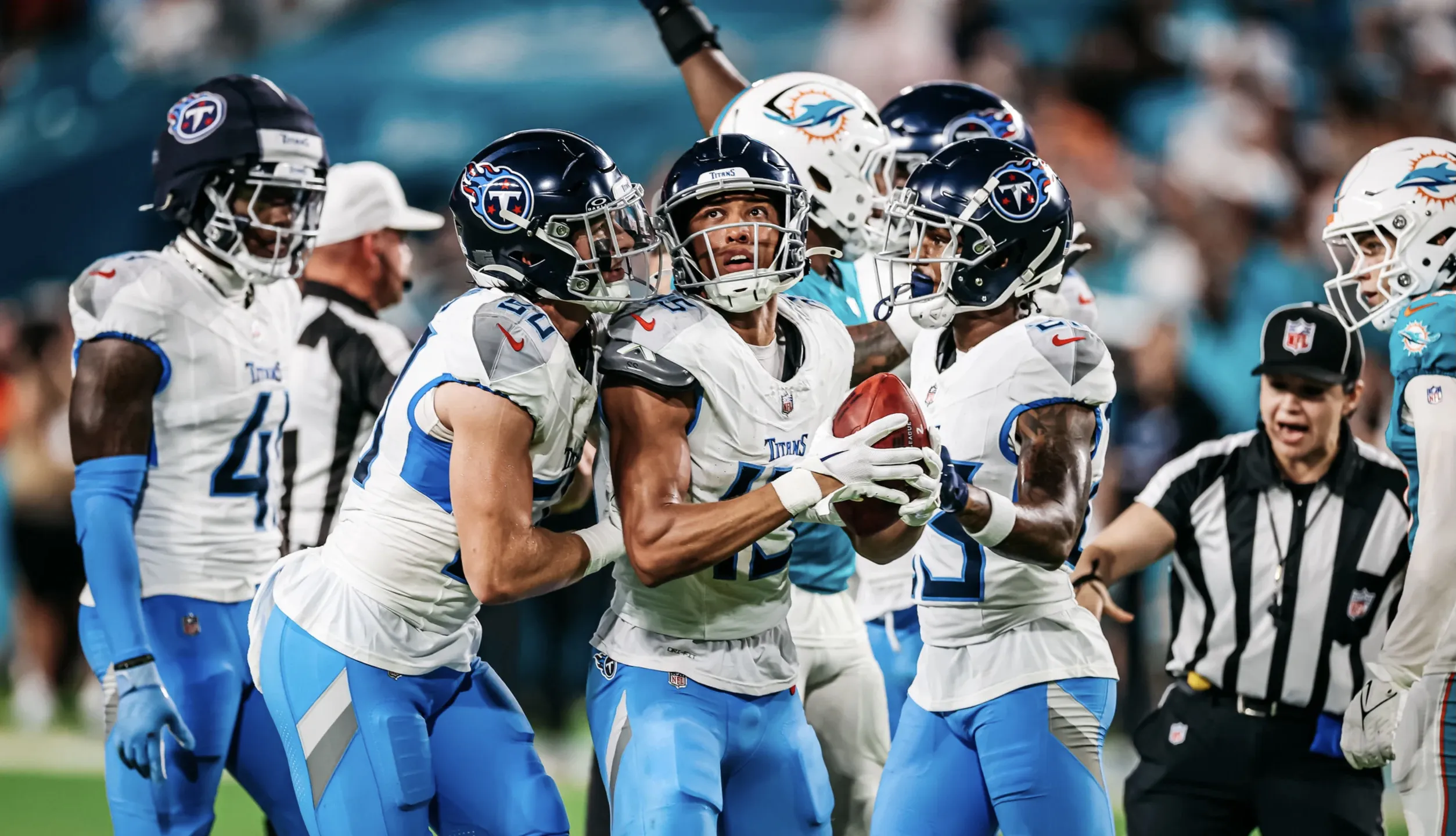 Titans stomp Dolphins for first win of the season