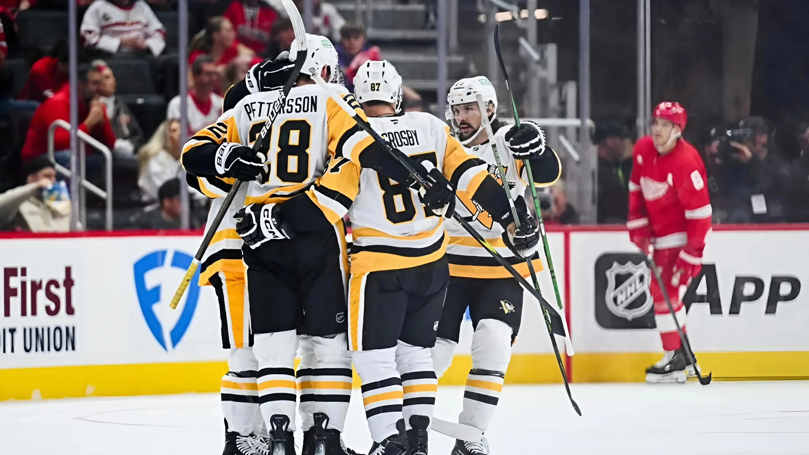 Three-goal surge in 2nd period fuels Penguins past Red Wings