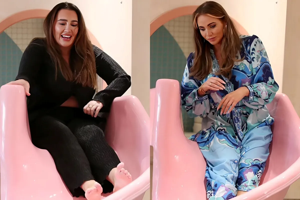 Lauren Goodger flashes her midriff in a stylish black co-ord as she takes turns on a slide with TOWIE co-star Amy Childs ngocc