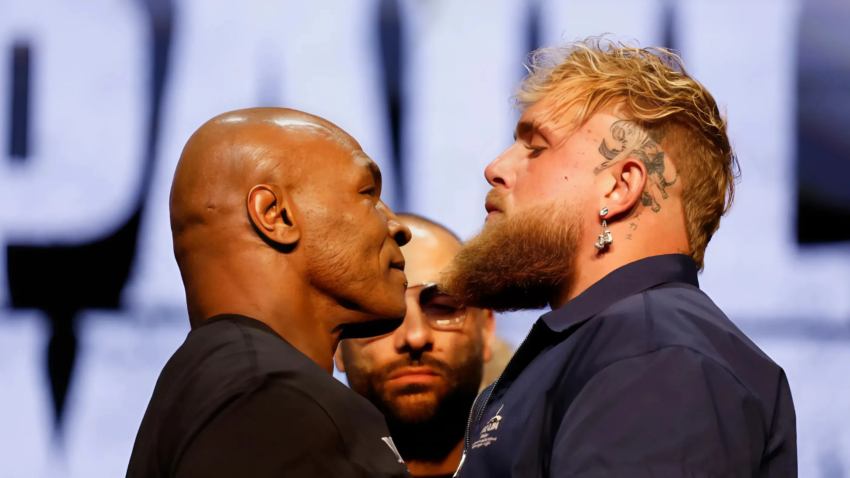 Boxers Jake Paul, Mike Tyson Square Up in Gritty Netflix Fight Night Trailer