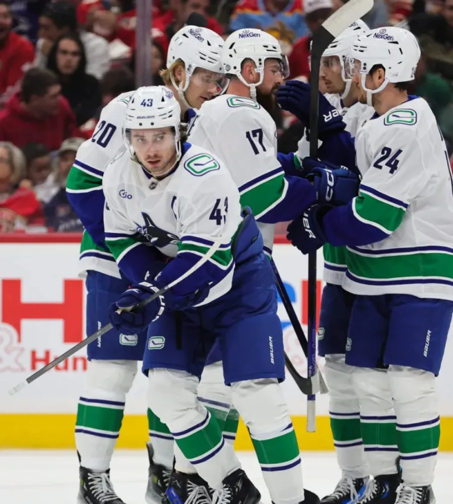 Hughes and Miller power Canucks to first win of the year vs. Panthers