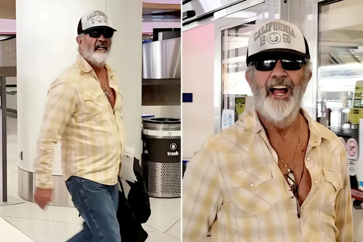 Hollywood superstar goes incognito as he lands in LA with a wild bushy white beard ngocc