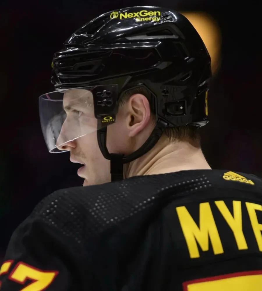 Canucks’ Miller gives ‘A’ away for Myers’ 1,000th game celebration