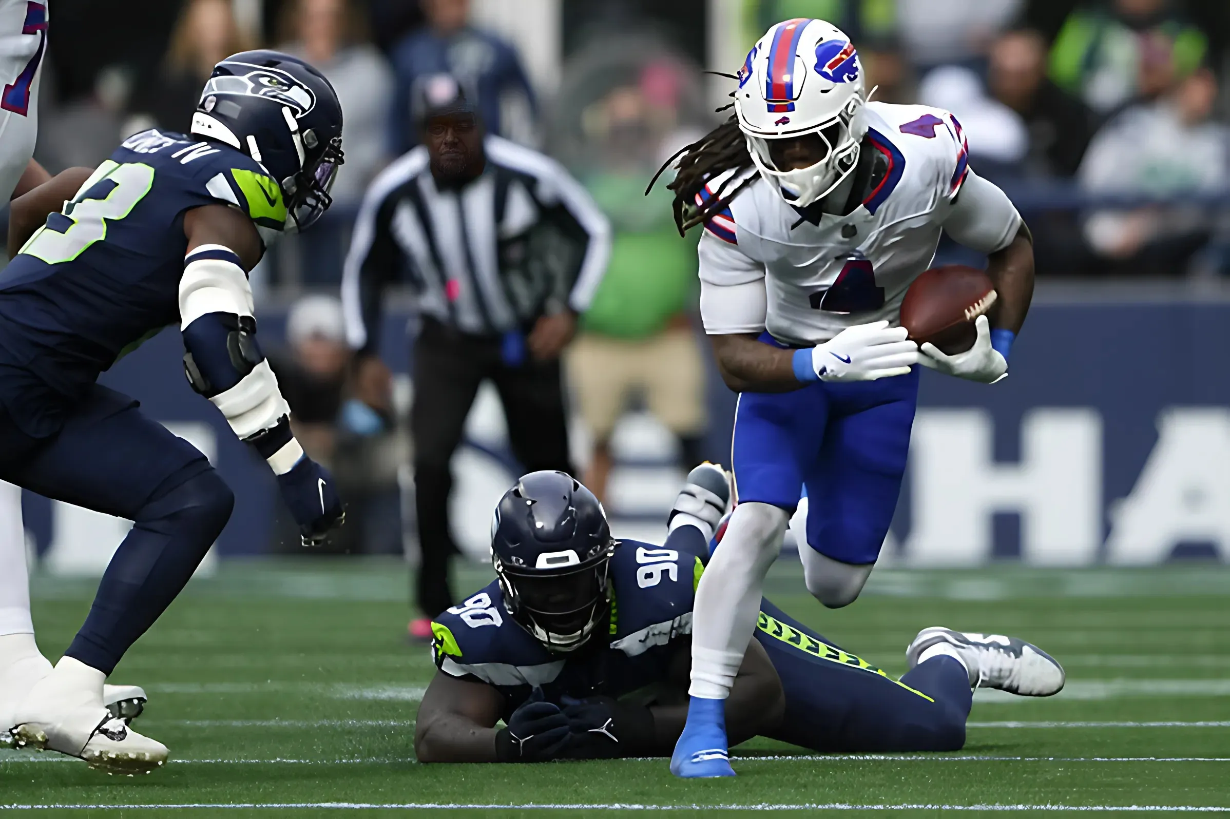 Seahawks teammates Derick Hall and Jarran Reed separated on sideline during loss to Bills