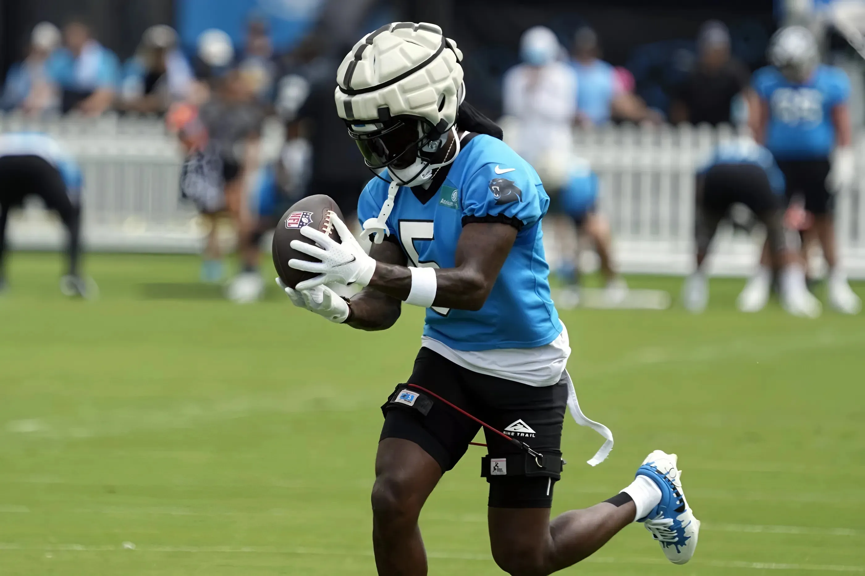 The Carolina Panthers traded wide receiver Diontae Johnson and a sixth-round pick to the Baltimore Ravens in exchange for a fifth-round pick