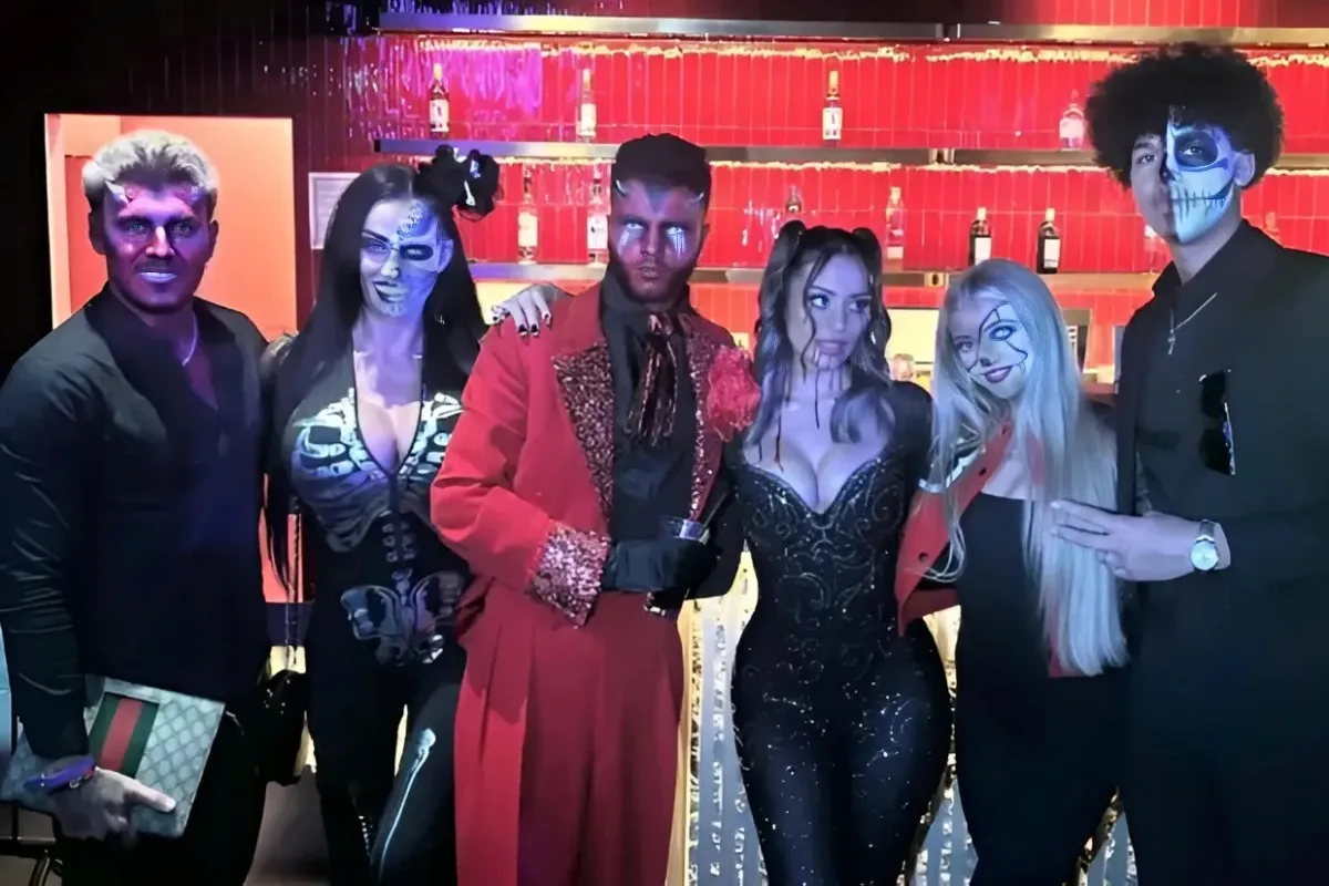 Proud mum Katie Price poses with Junior and Princess and their partners as they transform for Halloween ngocc