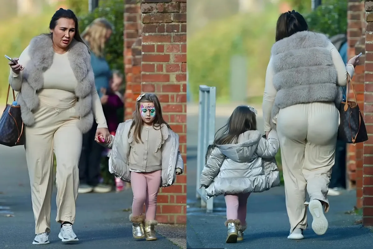 Lauren Goodger wears a cream tracksuit and fur gilet as she leaves the theatre with her daughter Larose ngocc