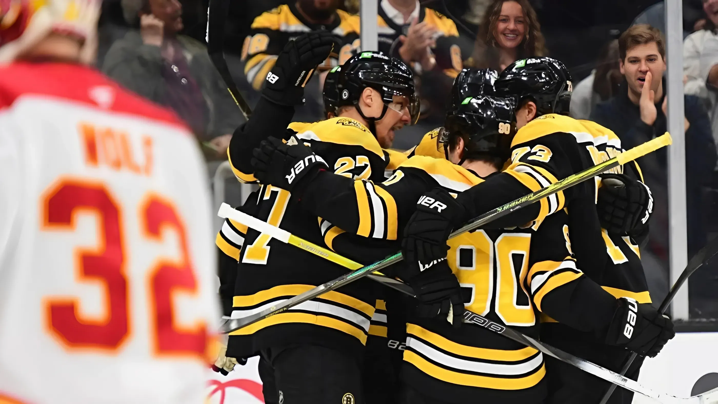 Flames force OT, but Brad Marchand wins it for Bruins