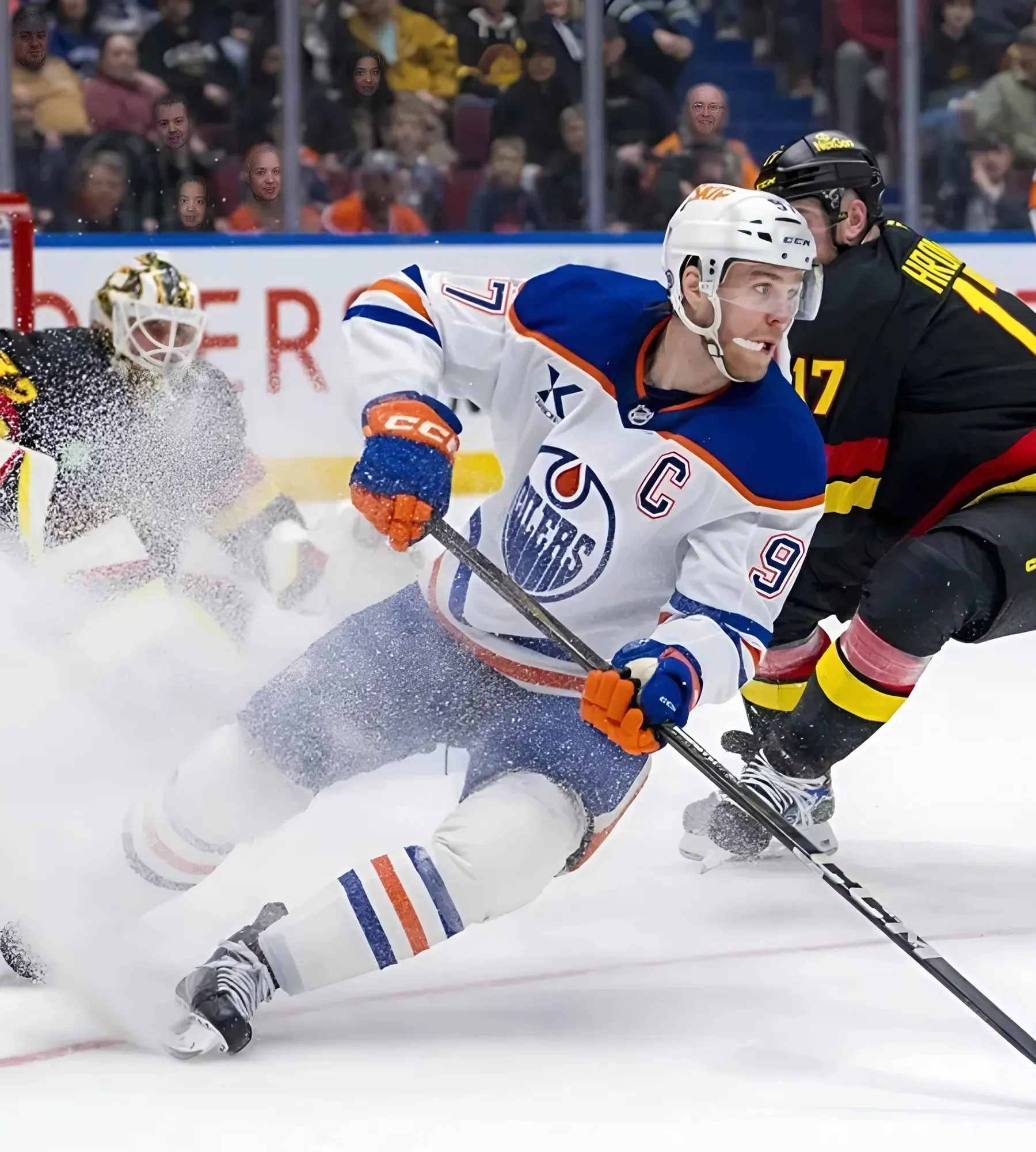 Oilers score 4 goals in third to pull away from Canucks