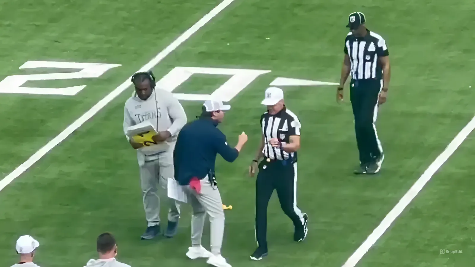 Titans HC Brian Callahan loses it after unnecessary roughness call