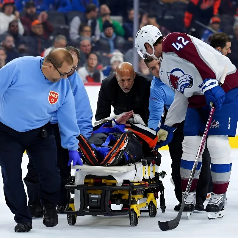 NHL referee Mitch Dunning injured in collision with Avs player