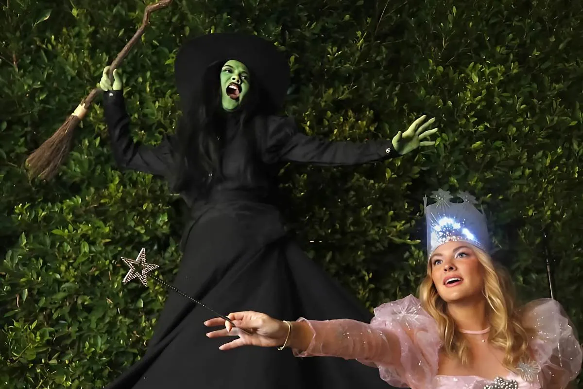 Becca Tilley Recreates ‘Wicked’ Movie Trailer with Girlfriend Hayley Kiyoko — See the Video! tram