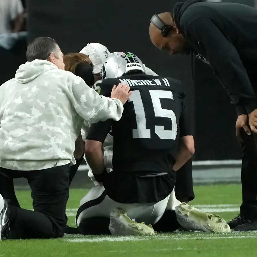 Raiders quarterback Gardner Minshew sustains a possibly severe injury in defeat to the Broncos