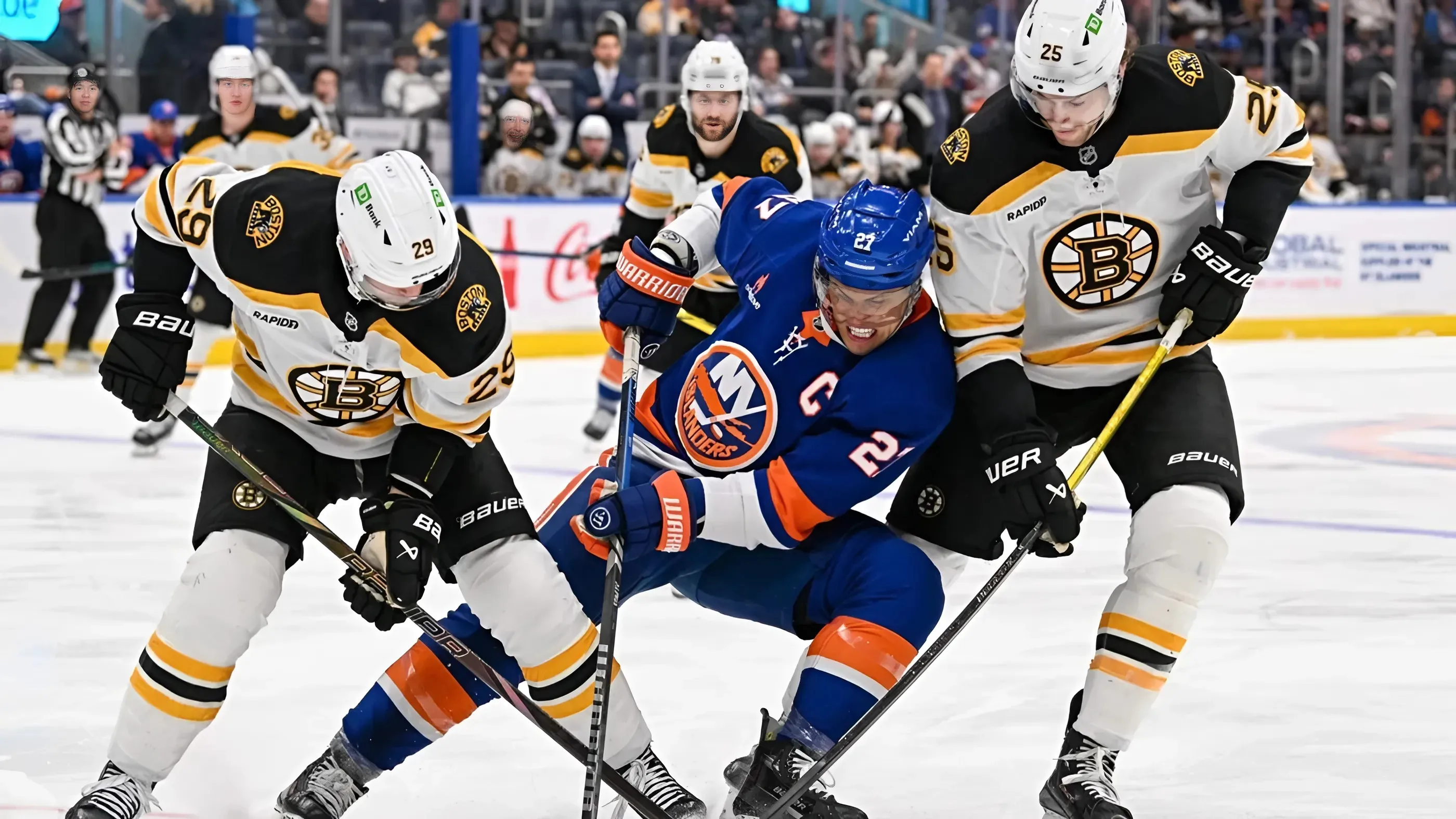 Bruins' three-goal third keeps Islanders reeling