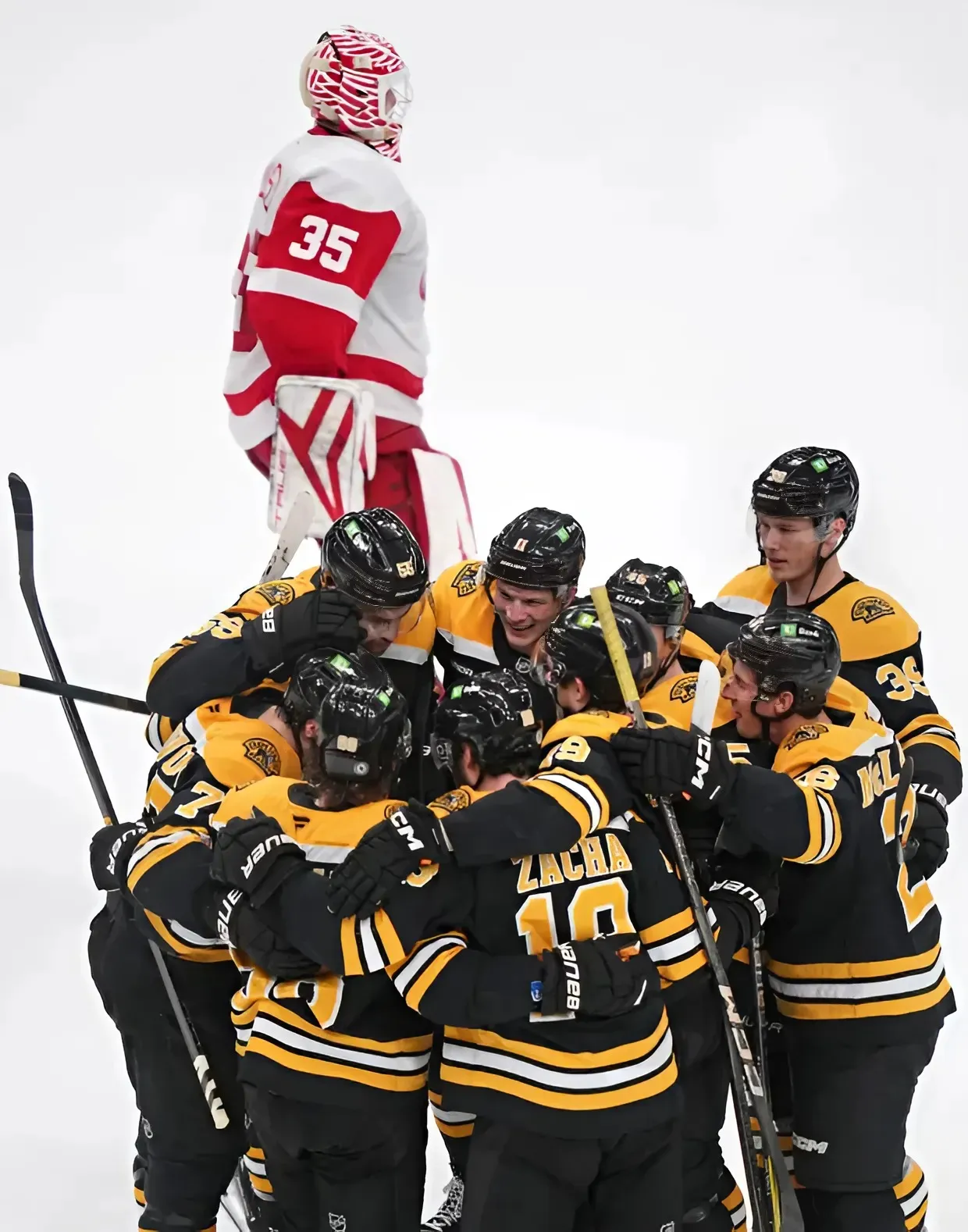 Pavel Zacha scores 2:15 into overtime and lifts the Bruins to a 3-2 win over the Red Wings