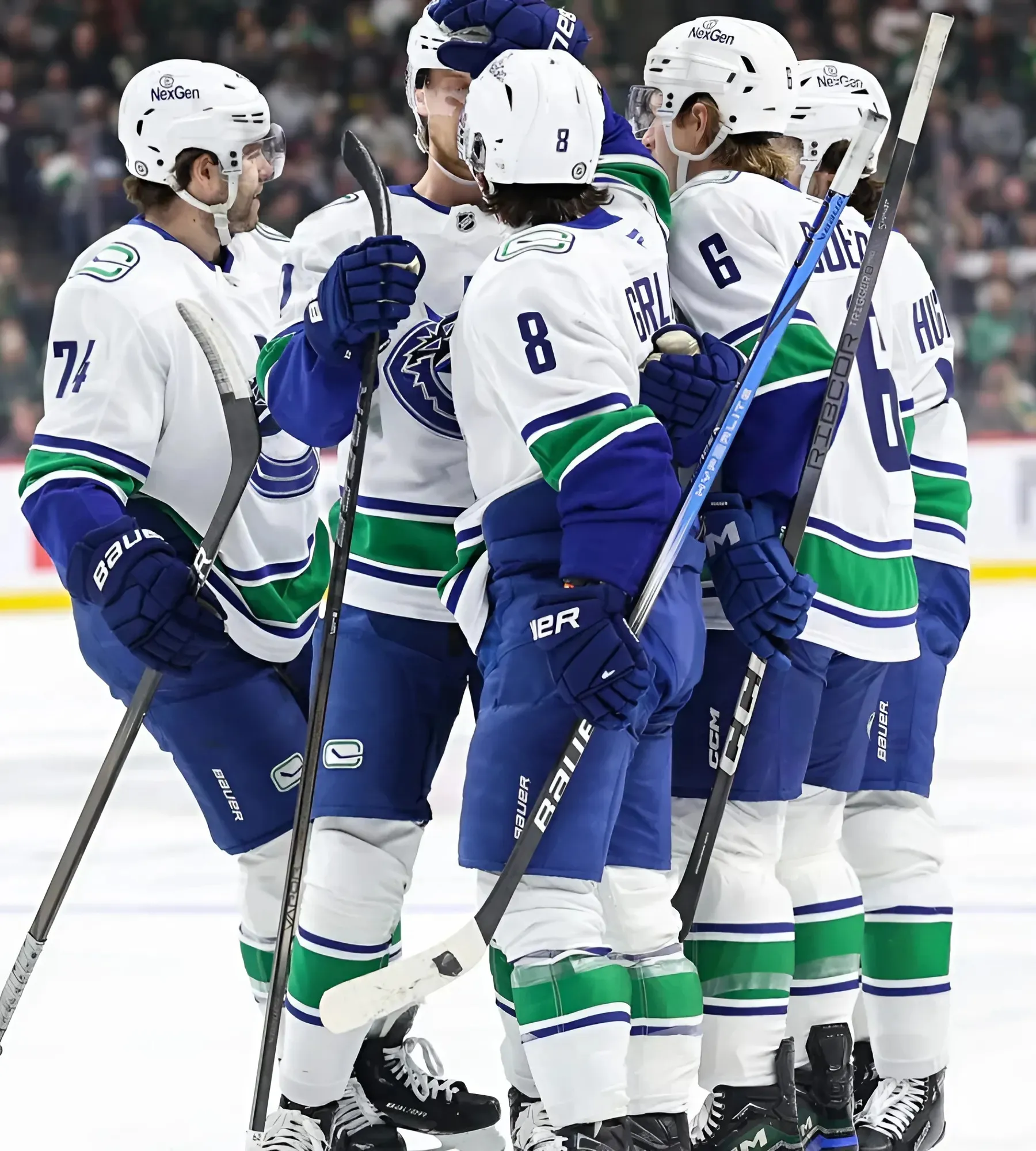 Canucks battle but fall 3-2 in OT to NHL-leading Wild