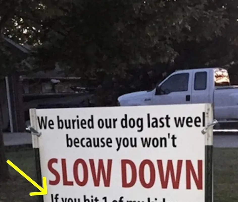 9. After dog is hit and killed by car, family's brutal sign has the whole neighborhood talking