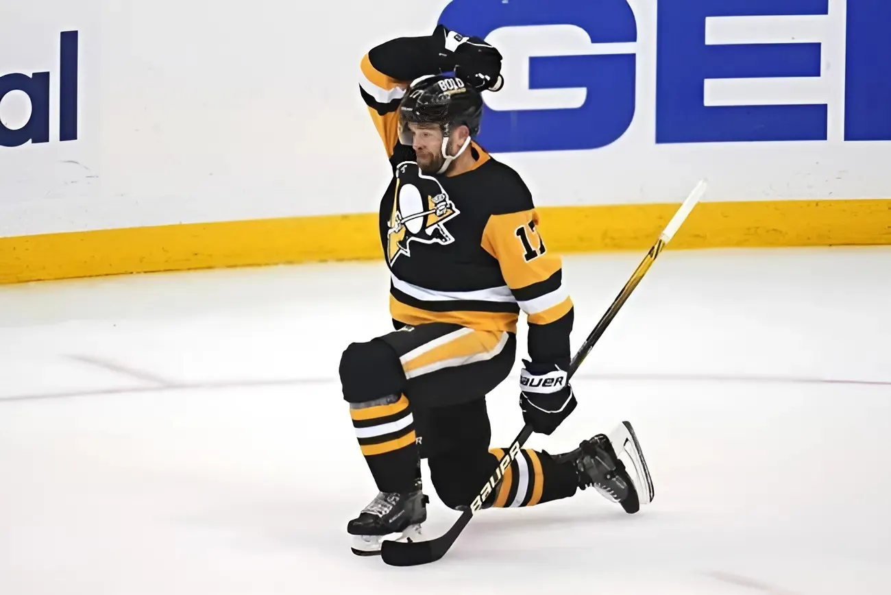 Bryan Rust Shines as Penguins Dominate Flyers 7-3