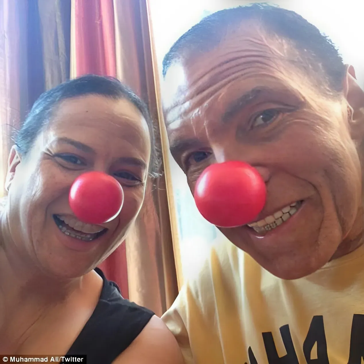 Muhammad Ali looks in high spirits as he becomes latest celebrity to lend his support to the inaugural American Red Nose Day