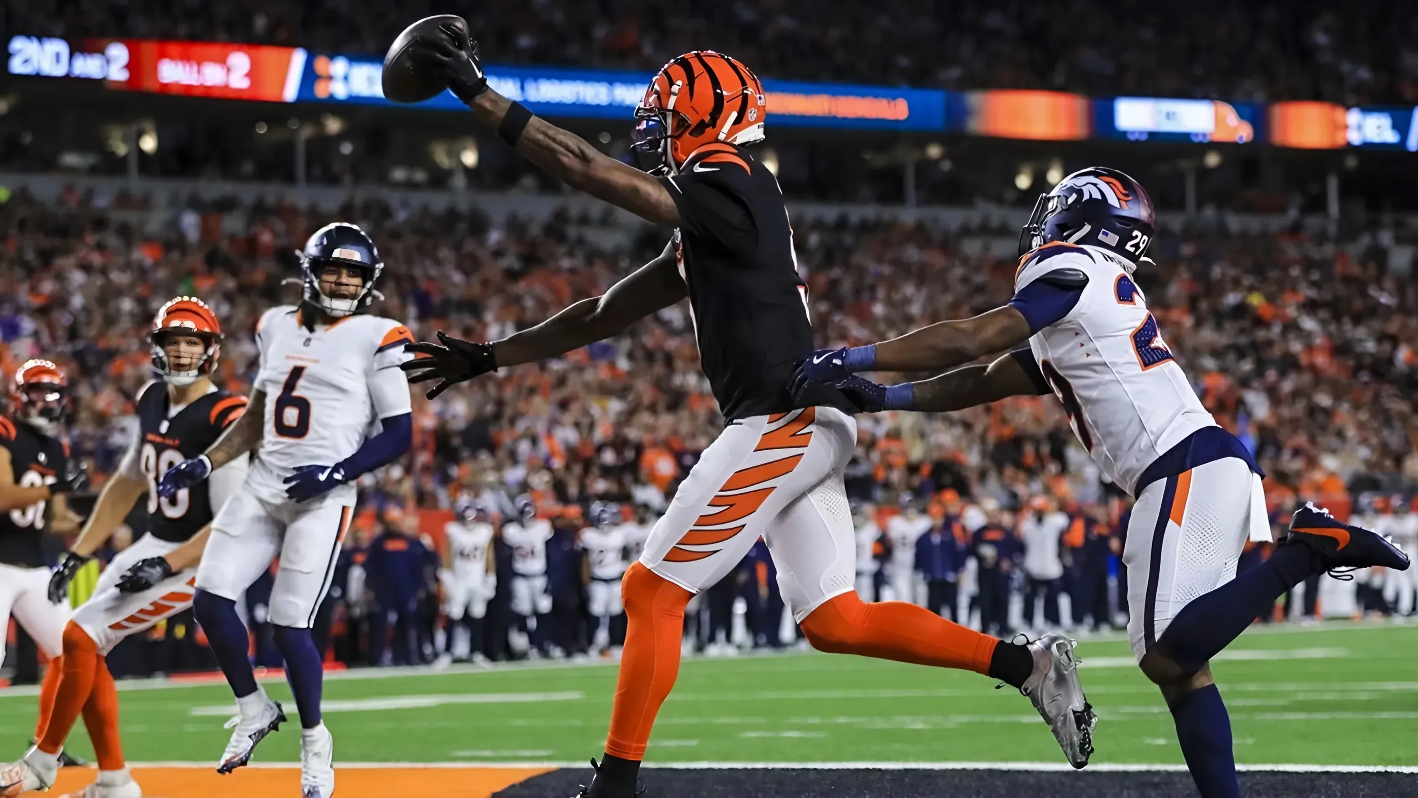 Bengals keep playoff hopes alive, survive in OT vs. Broncos