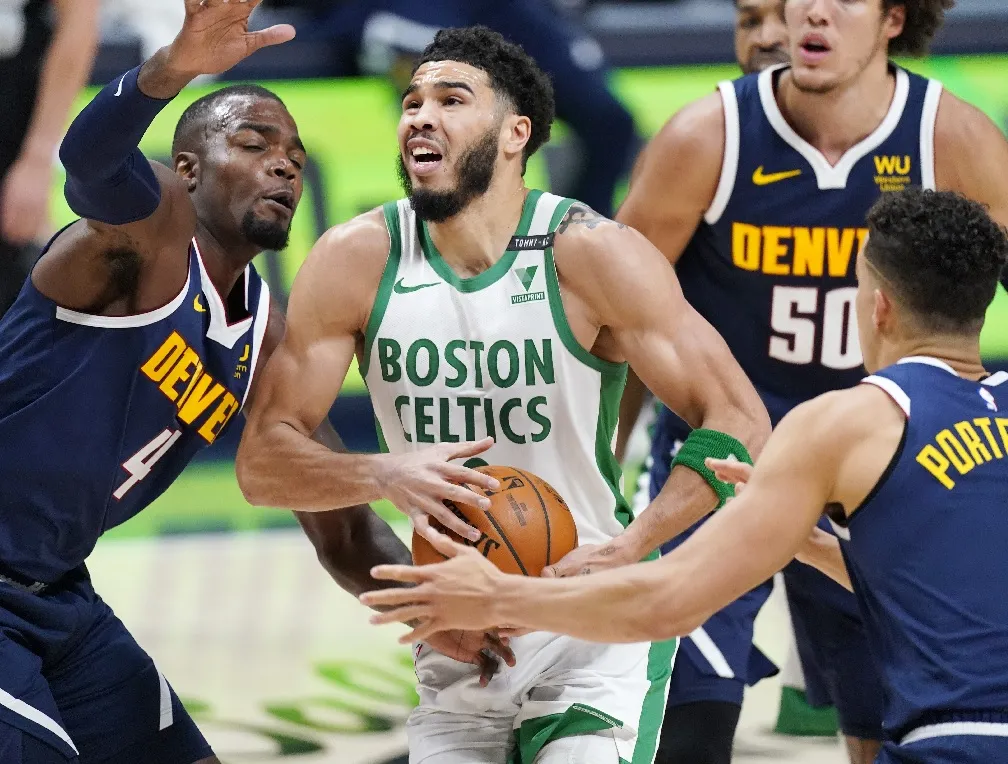 Jayson Tatum scores 29, Porzingis adds 25 as Celtics hold off depleted Nuggets 118-106