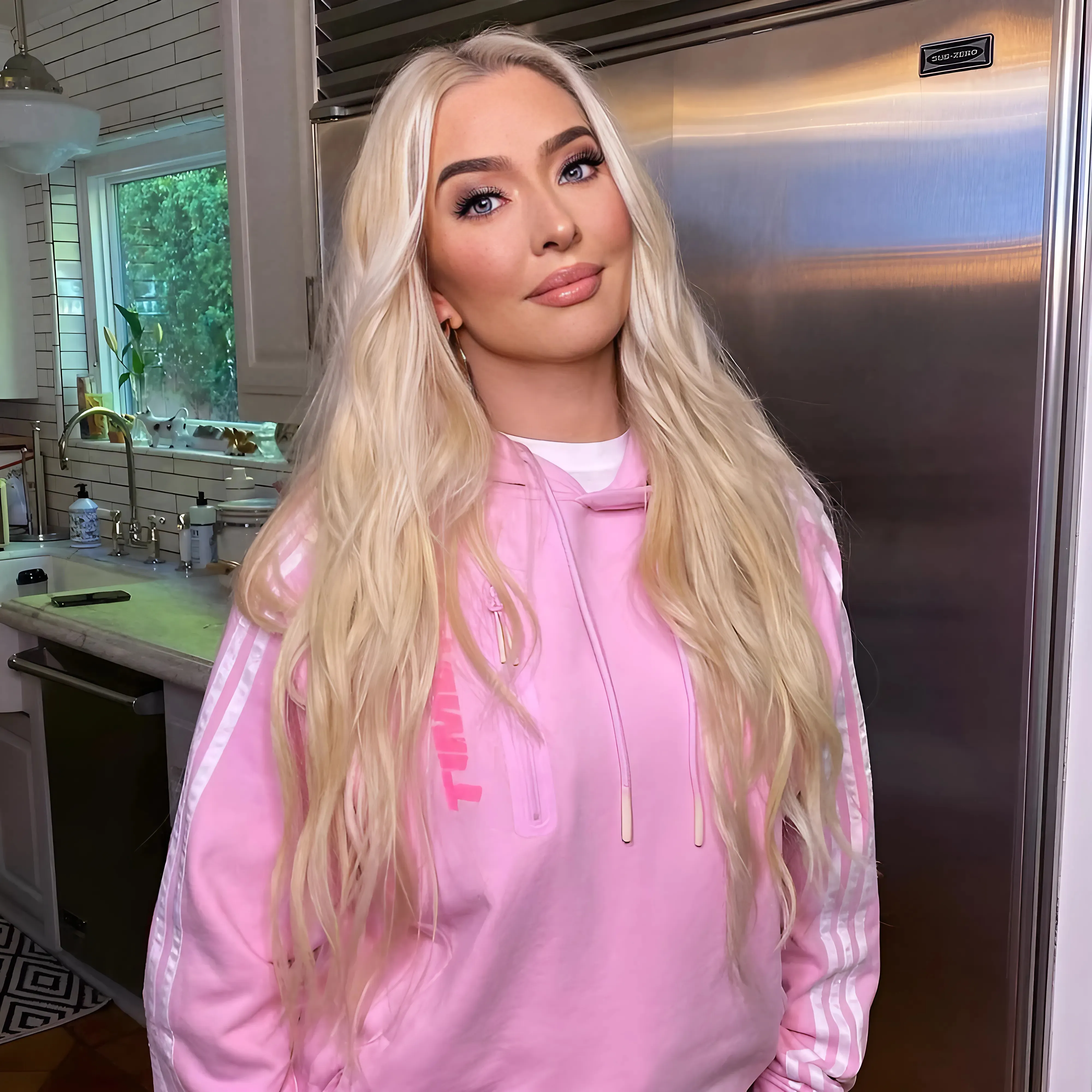 RUMOR HAS IT: Erika Jayne’s New Romance is with a Dashing Model and Medical Intern – and He’s 16 Years Younger than the RHOBH Star! - suong