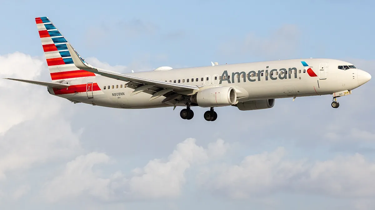 American Airlines flight attendant deploys duct tape barrier to stop business class passenger’s trash tossing