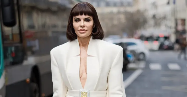 Lisa Rinna shows off a parade of wacky wigs at Paris Couture Week